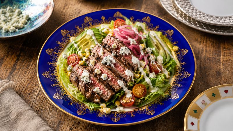 Grilled Steak Salad with Blue Cheese Dressing finished and ready to serve