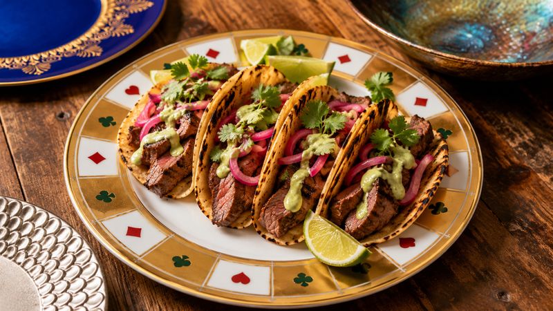 Grilled Steak Tacos with Jalapeño Crema finished and ready to serve